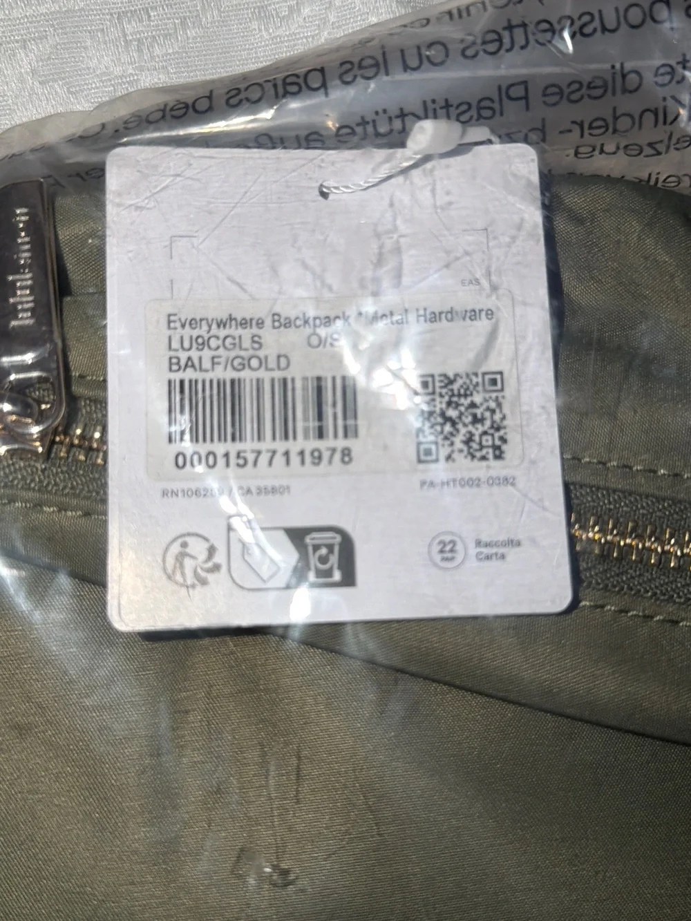 Green everywhere lululemon backpack with gold hardware